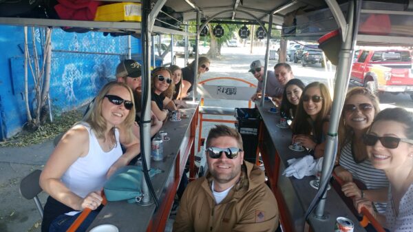 ty with group on tram