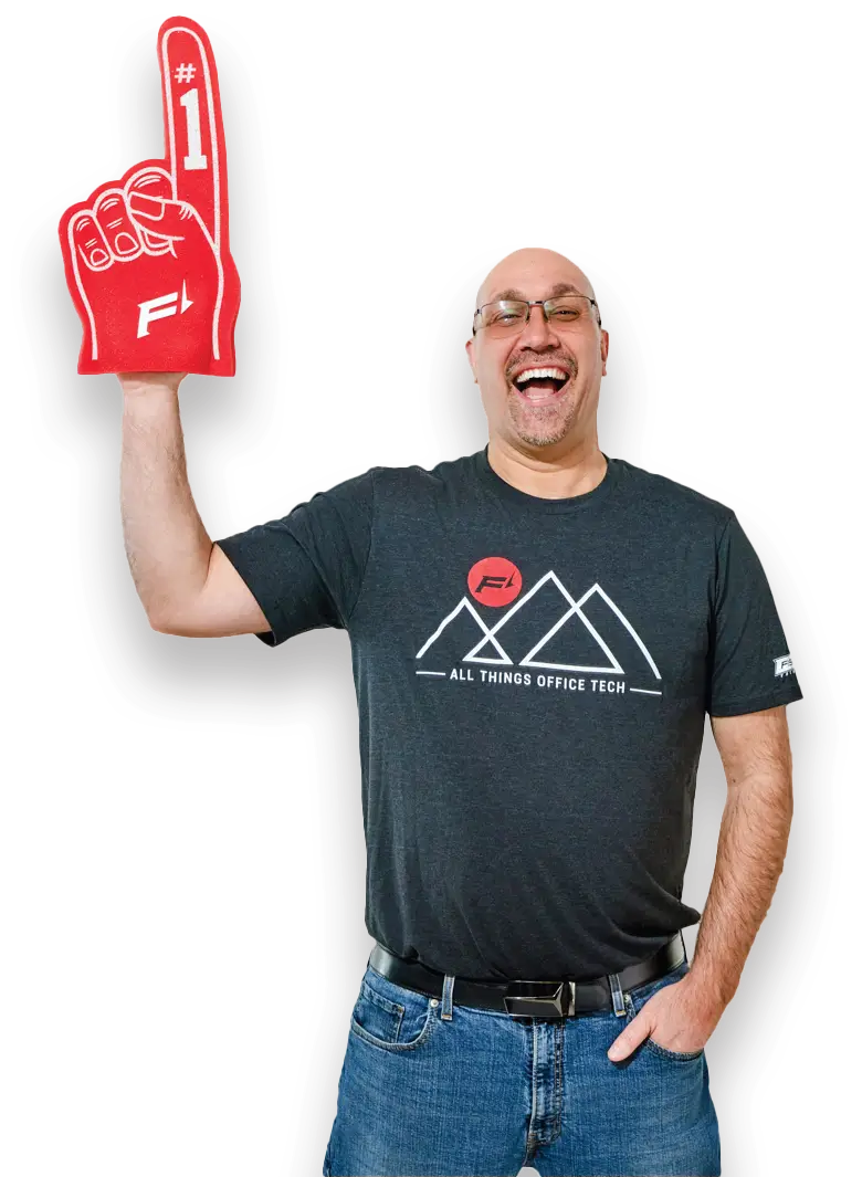 Cheerful man holding a red foam finger